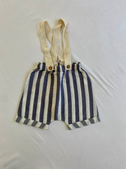 Striped trousers with suspenders